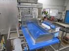 Quantum Topping Applicator With Recirculation Conveyors